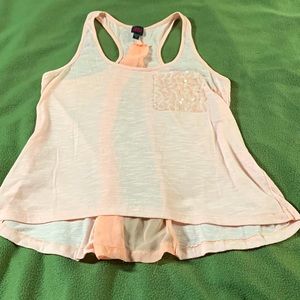 2b Bebe sheer, peach colored tank top.  Size small.